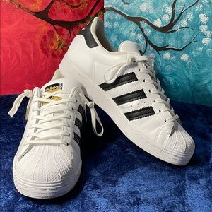 Adidas Superstar sneakers, specifically, Stan smith.